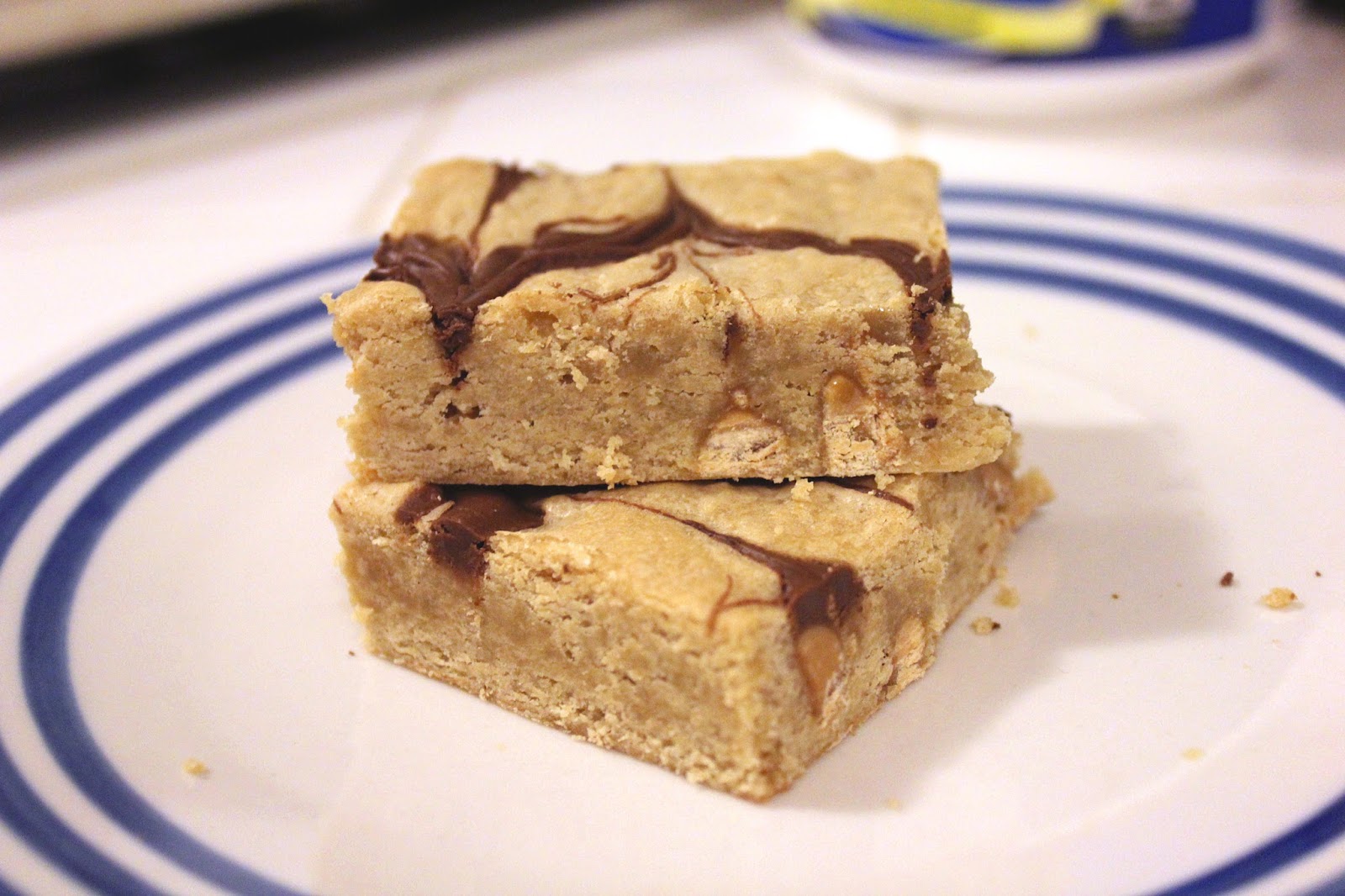 Nutella Swirl Peanut Butter Chip Blondies by freshfromthe.com